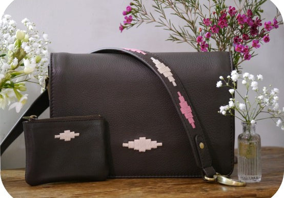 leather bag and purse with flowers
